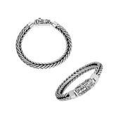 Sterling silver double-braided bracelet with ornamental engraved clasp shown in two angles on white background.